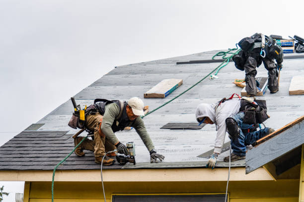 Professional Storm Damage Roof Repair technician working in Averill Park, NY